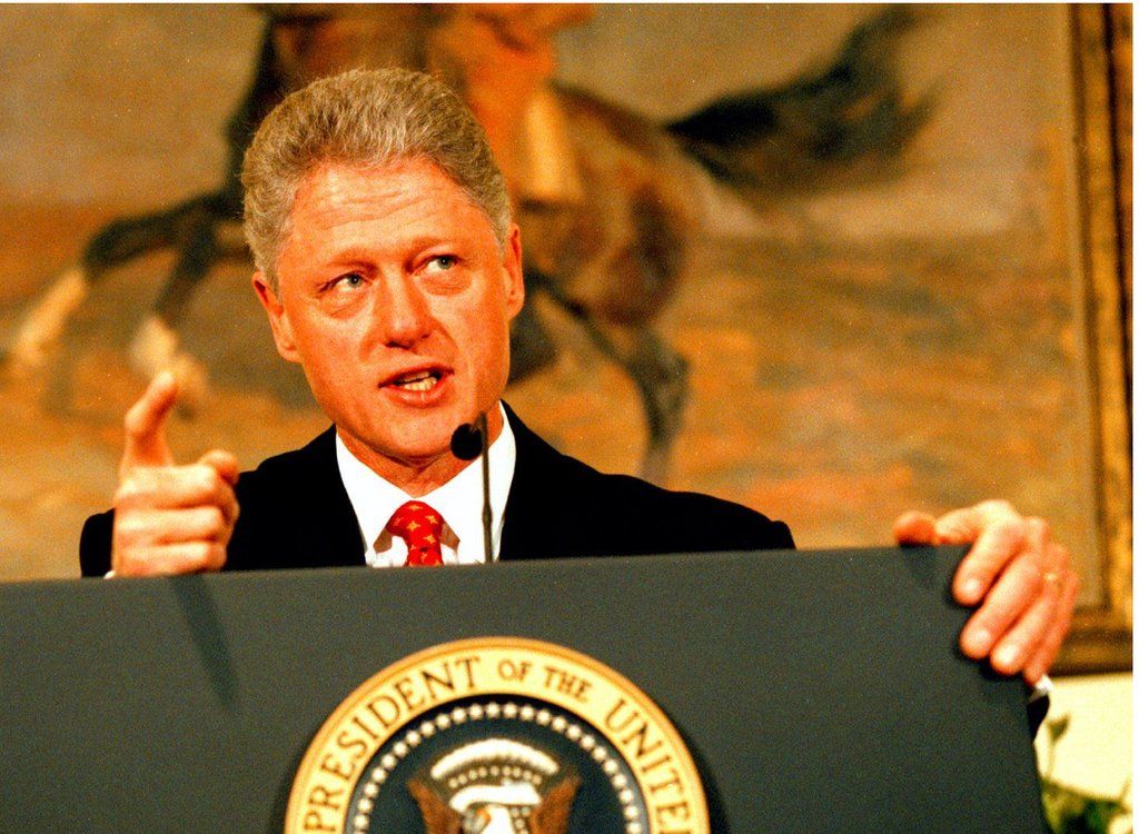 Bill Clinton wags his finger as he denies having "sexual relations with that woman, Miss Lewinsky" in a January 1998 press conference