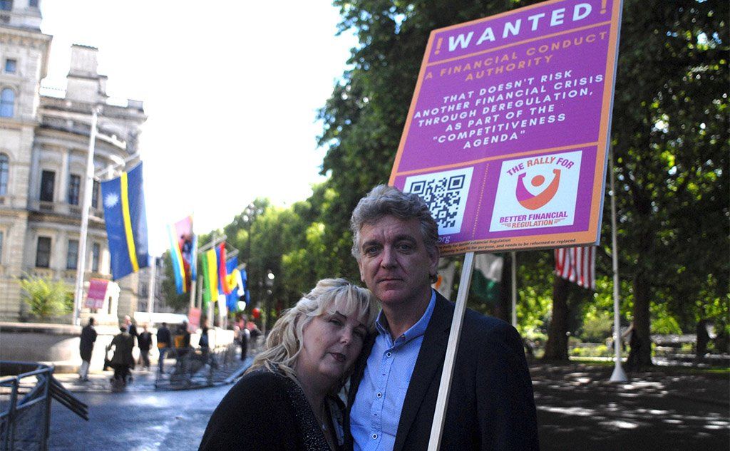 Paul and Jane Stevens at a demonstration calling for better financial regulation after they lost their savings in the Blackmore Bonds collapse
