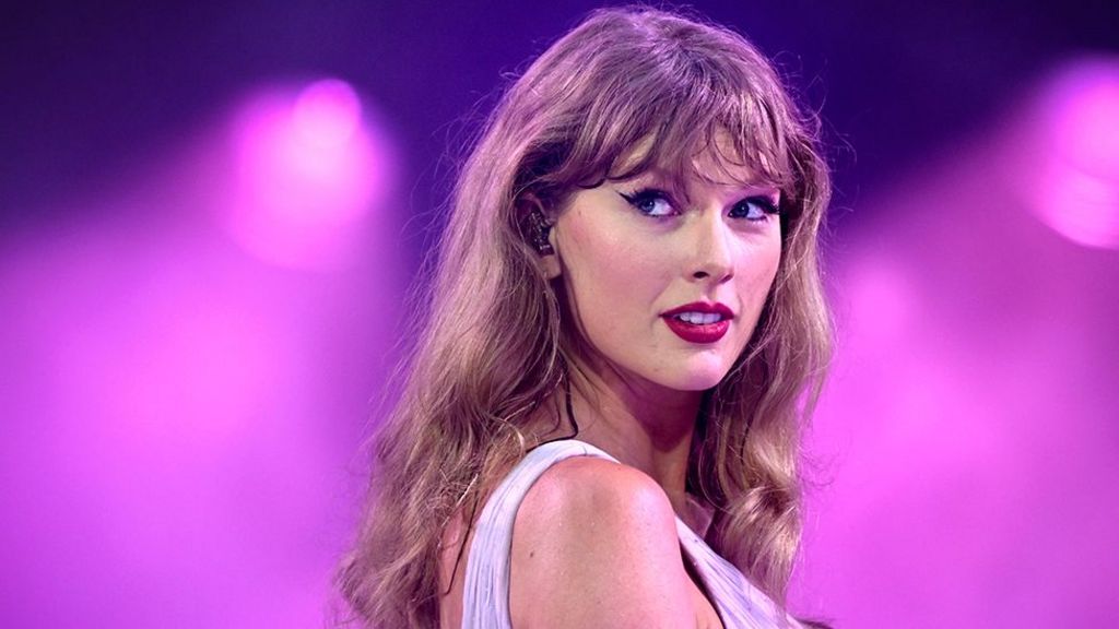 Head and shoulders shot shows Taylor Swift looking on as she performs at London's Wembley Stadium. Photo: 21 June 2024