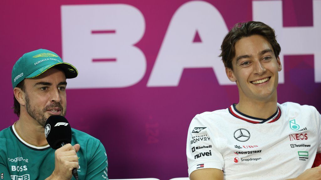 Fernando Alonso and George Russell speak in a news conference at testing in Bahrain