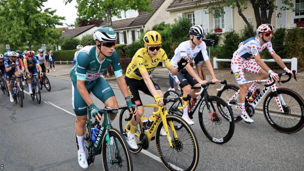 Distinctive jersey riders Jasper Philipsen, Jonas Vingegaard, Tadej Pogacar and Giulio Ciccone during the final stage of the 2023 Tour de France