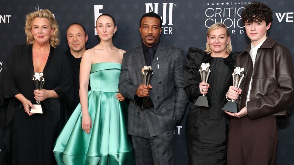 Hannah Walters, Stephen Graham, Erin Doherty, Ashley Walters, Christine Tremarco, and Owen Cooper pose in the press room during the 31st Annual Critics Choice Awards at Barker Hangar on January 04, 2026 in Santa Monica, California