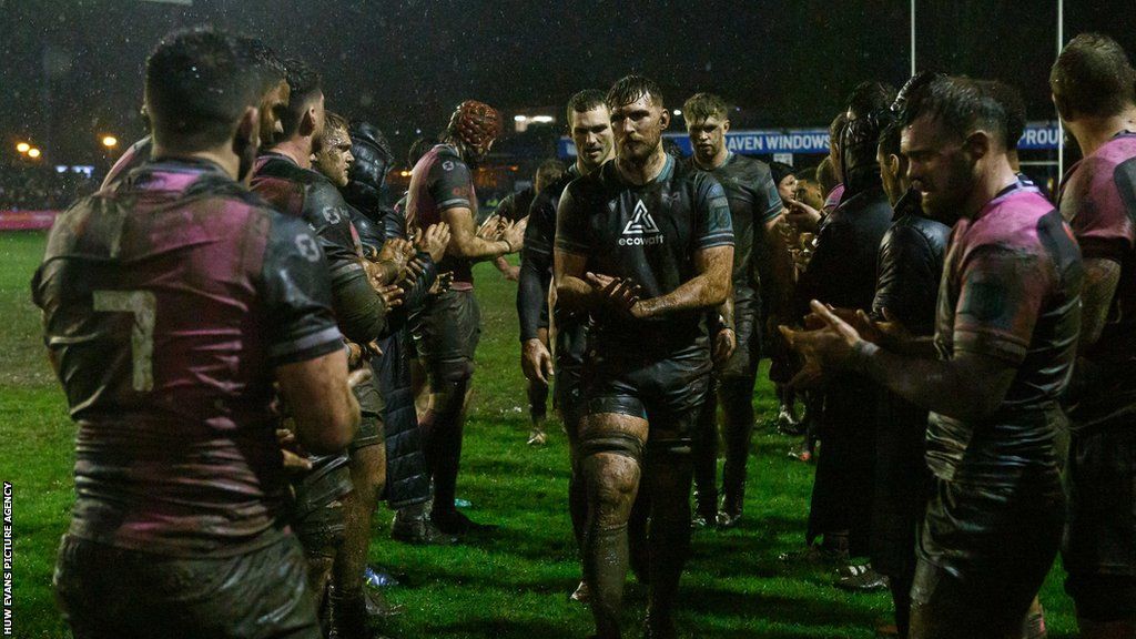 Ospreys players clapped off by Cardiff following the United Rugby Championship game in Bridgend