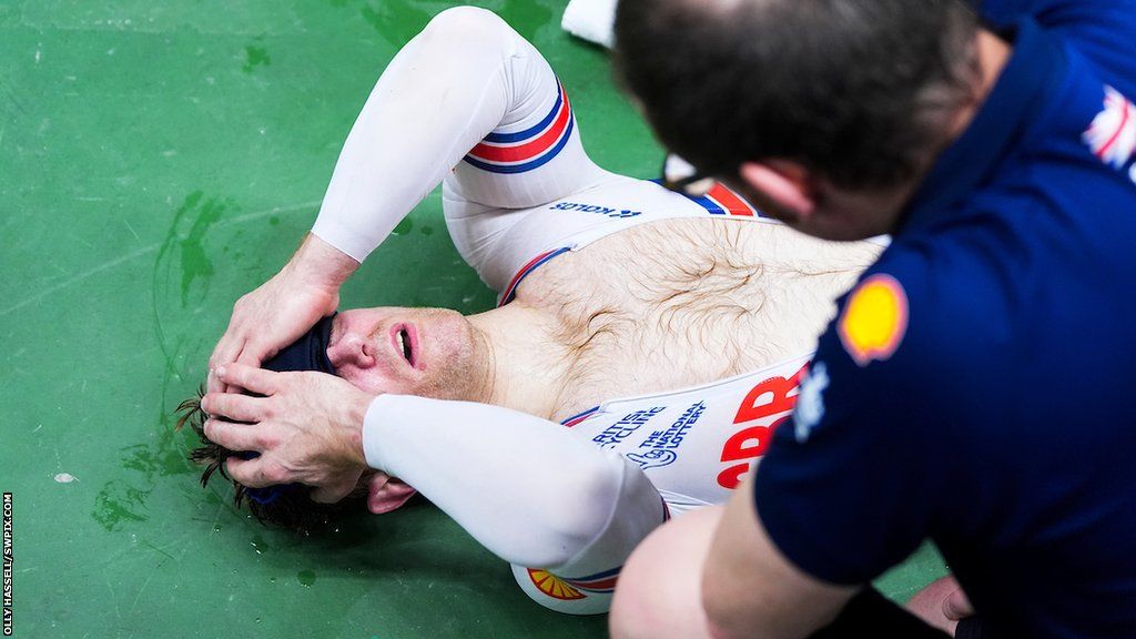 Jody Cundy collapsed with exhaustion after winning the men's C5 1km time-trial