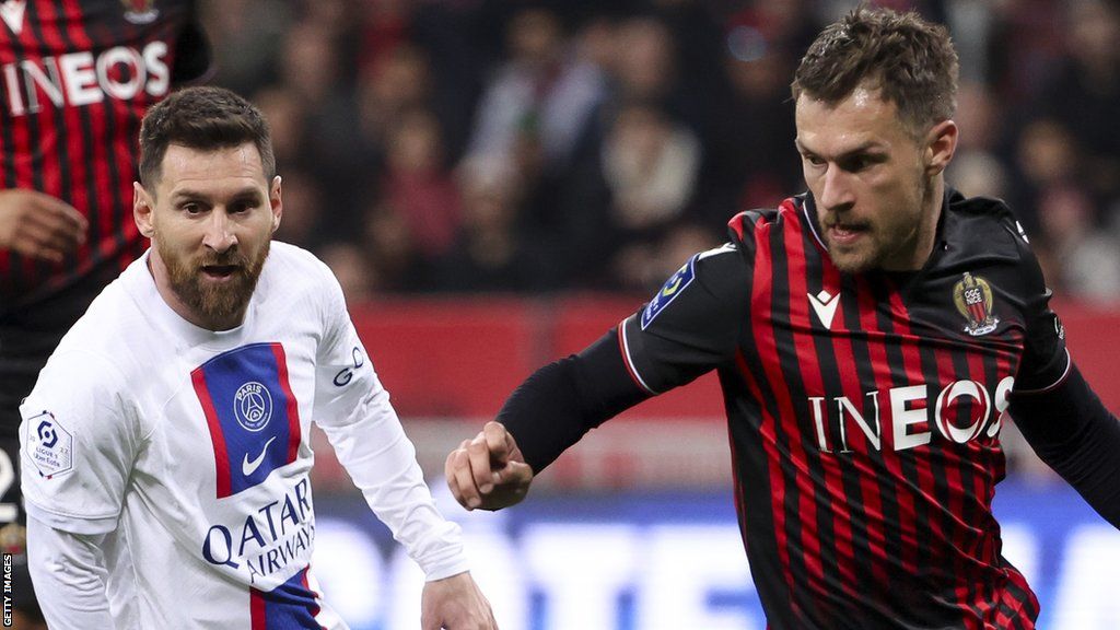 PSG's Lionel Messi and Aaron Ramsey, then of Nice, compete for the ball in April, 2023