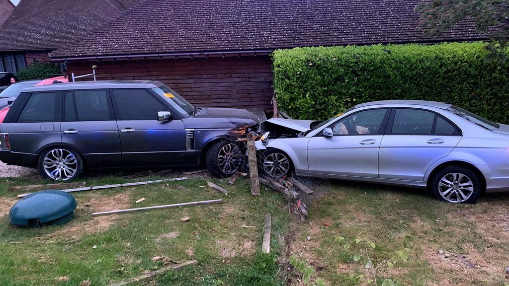 Video footage shows cars narrowly missing a house near a new road built to bypass HS2 work.