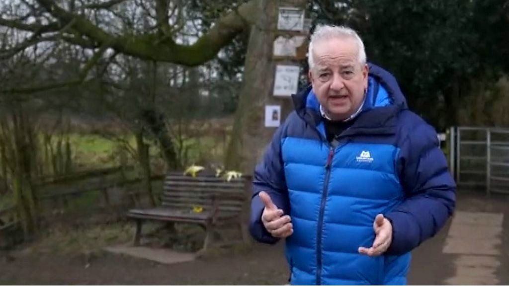 BBC's Nick Garnett standing next to the bench that was the last known location of Nicola Bulley