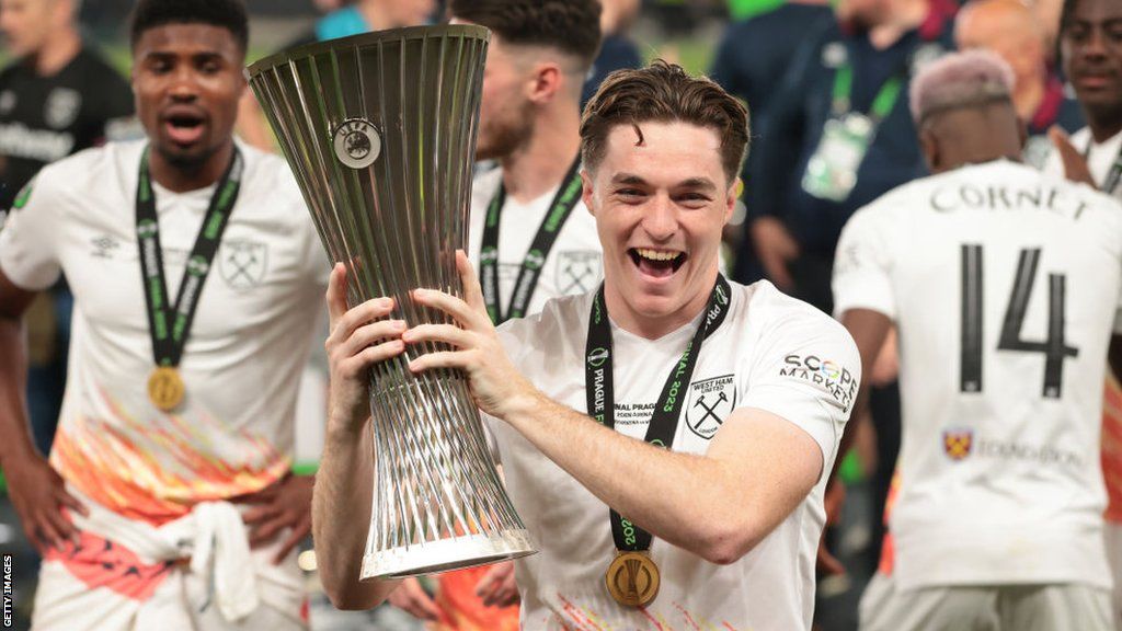 Conor Coventry lifts the Europa Conference League trophy