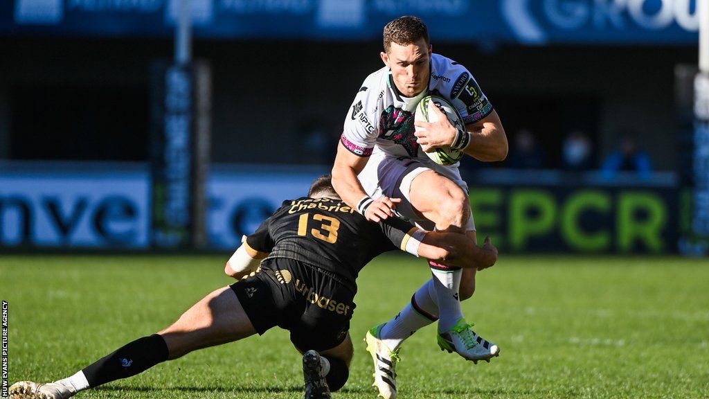 Ospreys centre George North is tackled by Montpellier opposite number Pierre Lucas