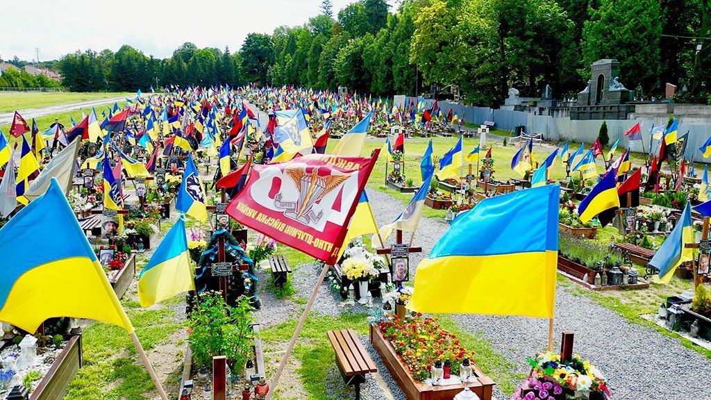 Cemetery in Lviv with flags for the war dead