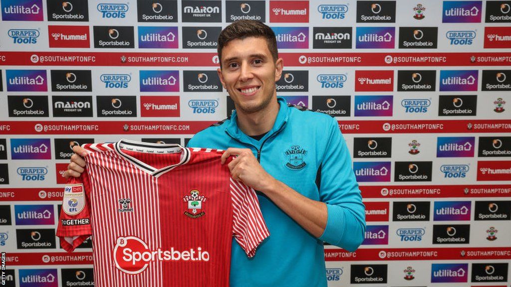 Ross Stewart posing with a Southampton shirt
