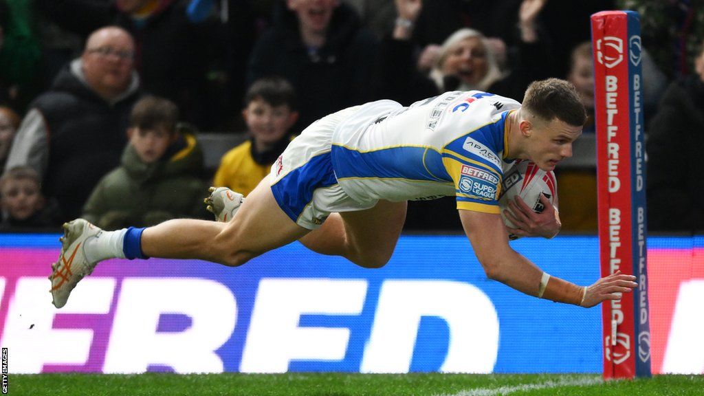 Ash Handley finishes a brilliant solo try for Leeds Rhinos against Salford Red Devils