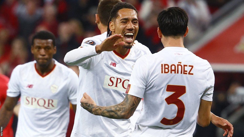 AS Roma's Chris Smalling and Roger Ibanez celebrate after the Europa League semi-final at Bayern Leverkusen