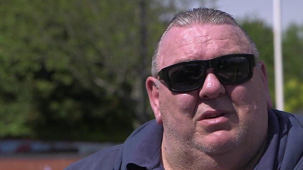 ExWales keeper Neville Southall speaks with Cardiff schoolchildren