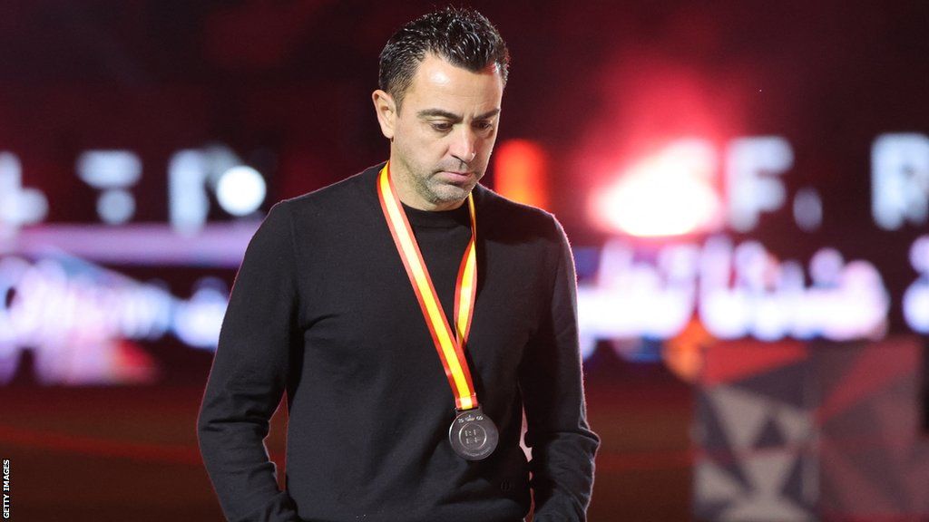 Xavi wearing his losers medal after Barcelona's 4-1 Spanish Super Cup defeat by Real Madrid