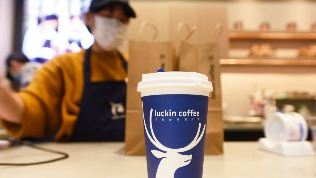 A staff member works in a Luckin Coffee outlet in Hangzhou in east China's Zhejiang province.