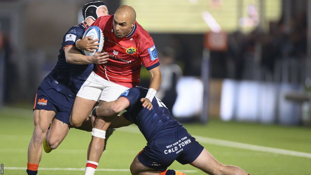 Munster's Simon Zebo is tackled by Edinburgh's Darcy Graham and Wes Goosen last weekend