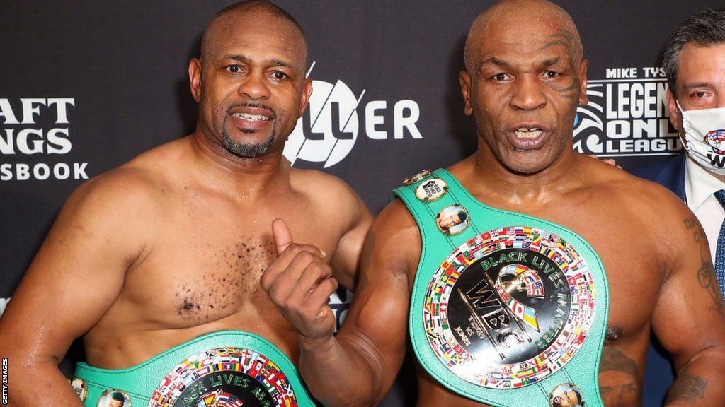Mike Tyson and Roy Jones Jr side by side after their exhibition bout