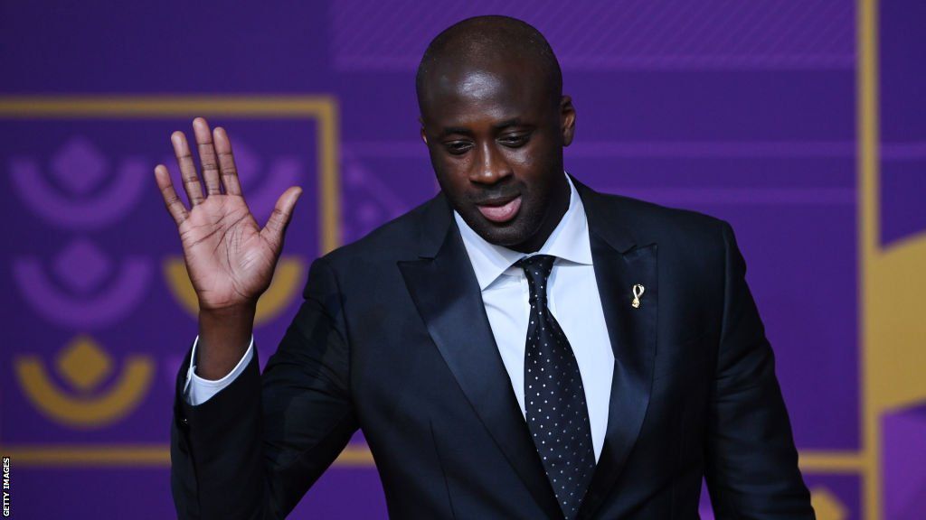 Yaya Toure waves to the audience after giving a speech