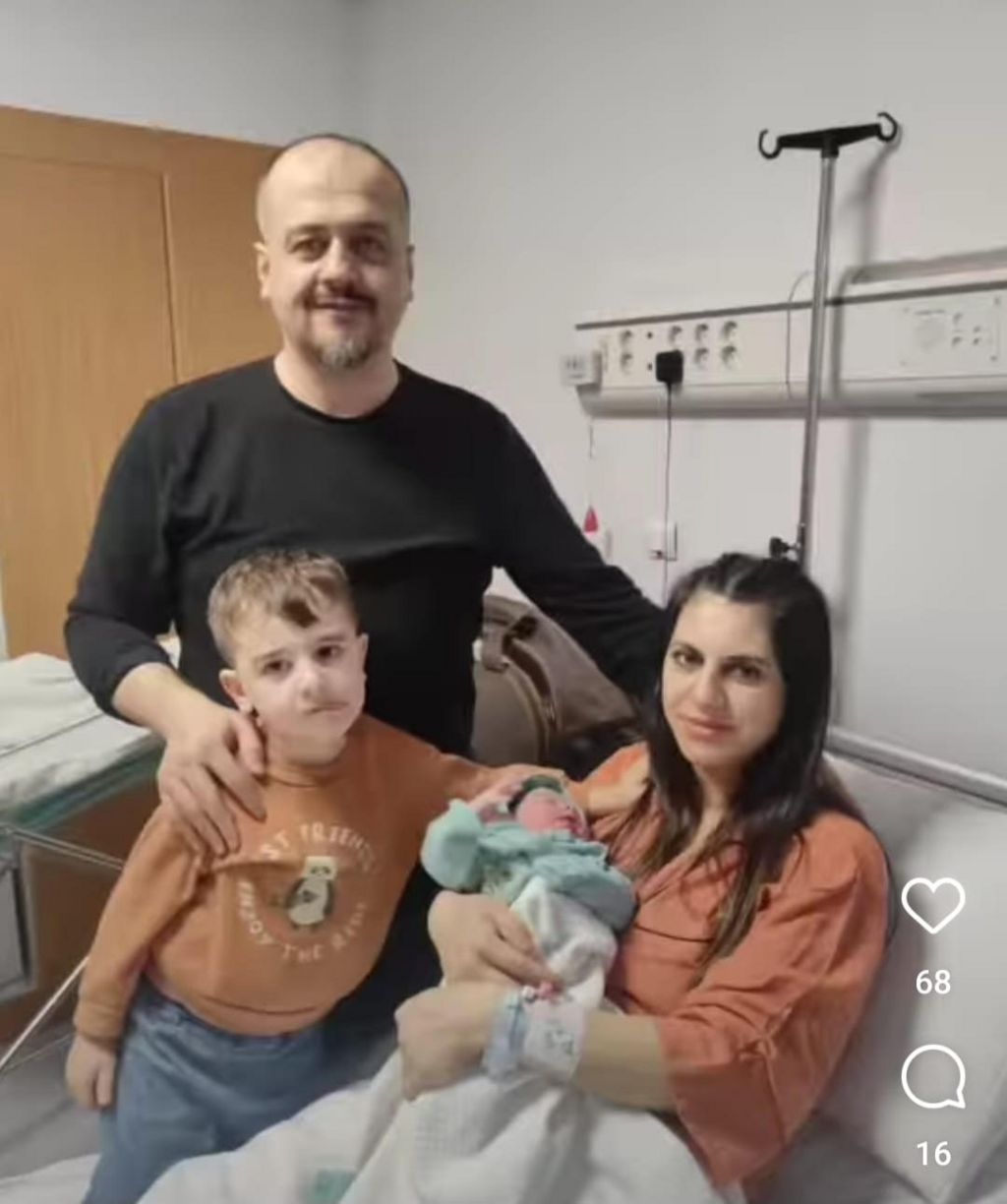 Necla with her husband Irfan and three-year-old son Yigit Kerim in hospital