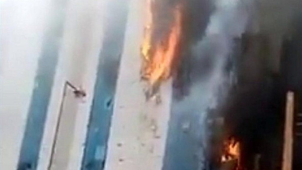 Video shows a fire raging at the building in the heart of the capital, Khartoum.