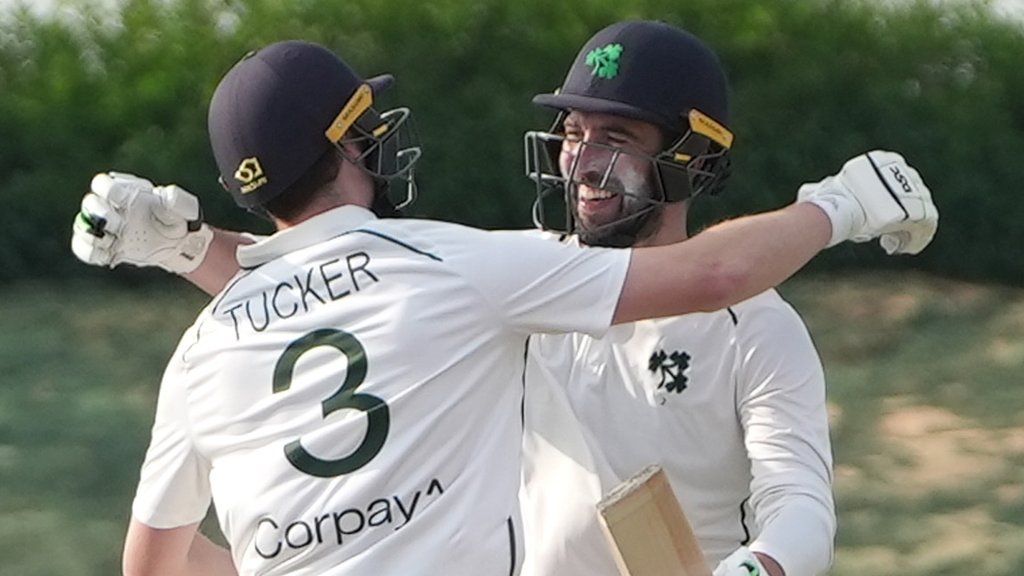 Irish pair Lorcan Tucker and Andrew Balbirnie embrace after securing a six-wicket win over Afghanistan on Friday
