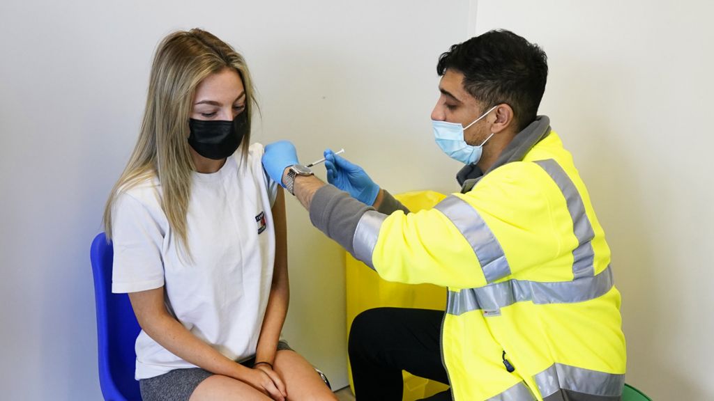 Young person being vaccinated