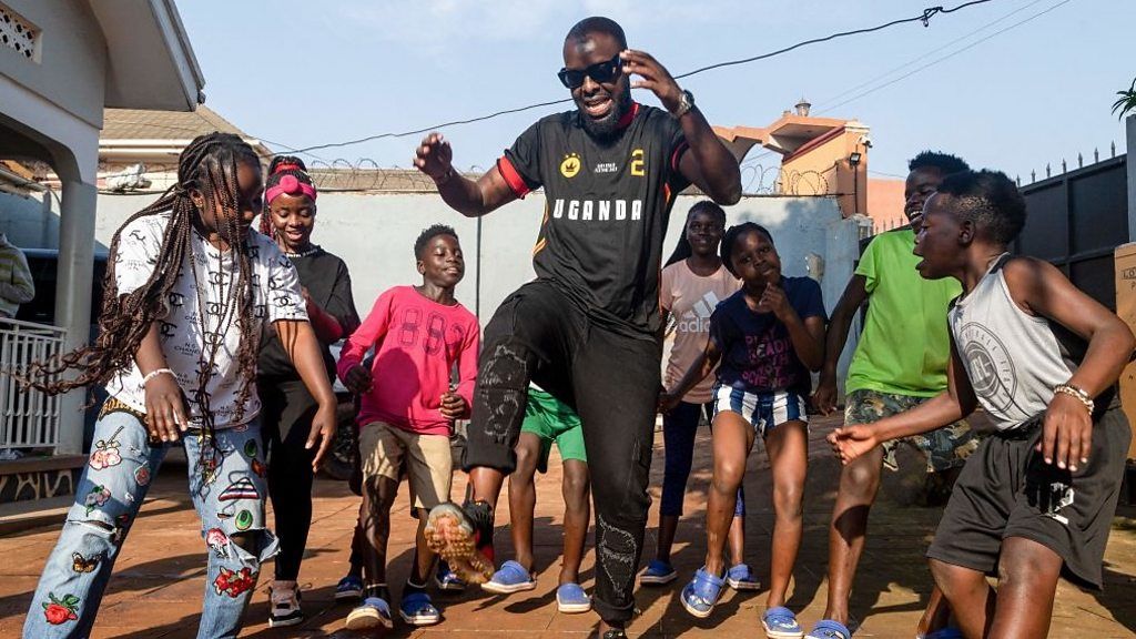 Members of Ghetto Kids and Ugandan musician Eddy Kenzo