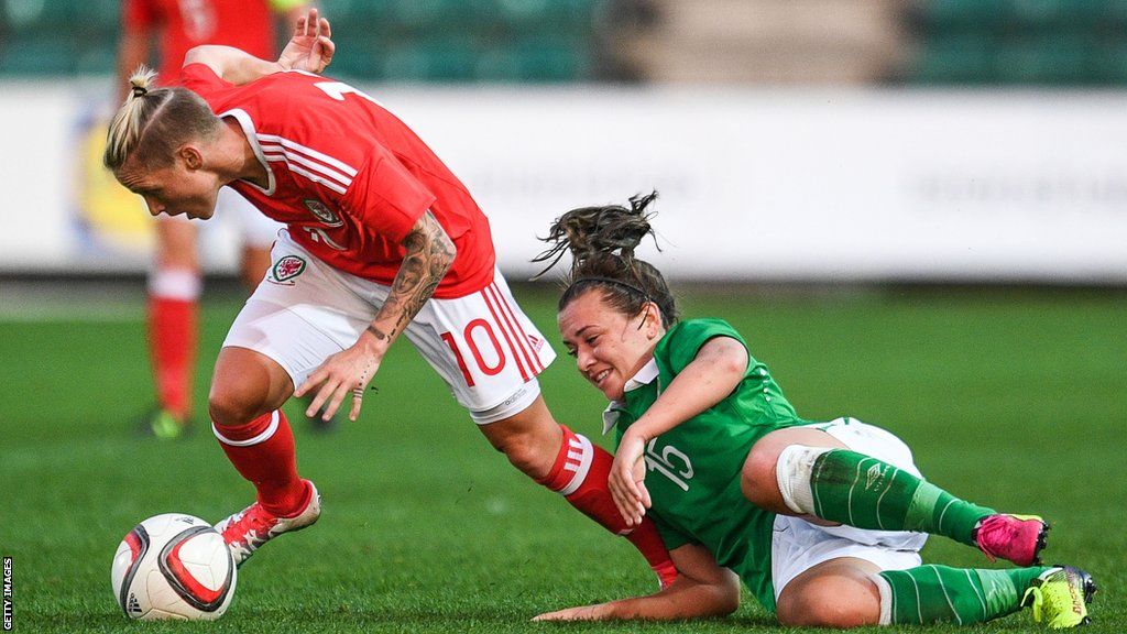 Wales' Jess Fishlock under pressure from Republic of Ireland's Katie McCabe during the Women's B International Friendly Challenge match between Wales and Republic of Ireland at Rodney Parade on August 19, 2016