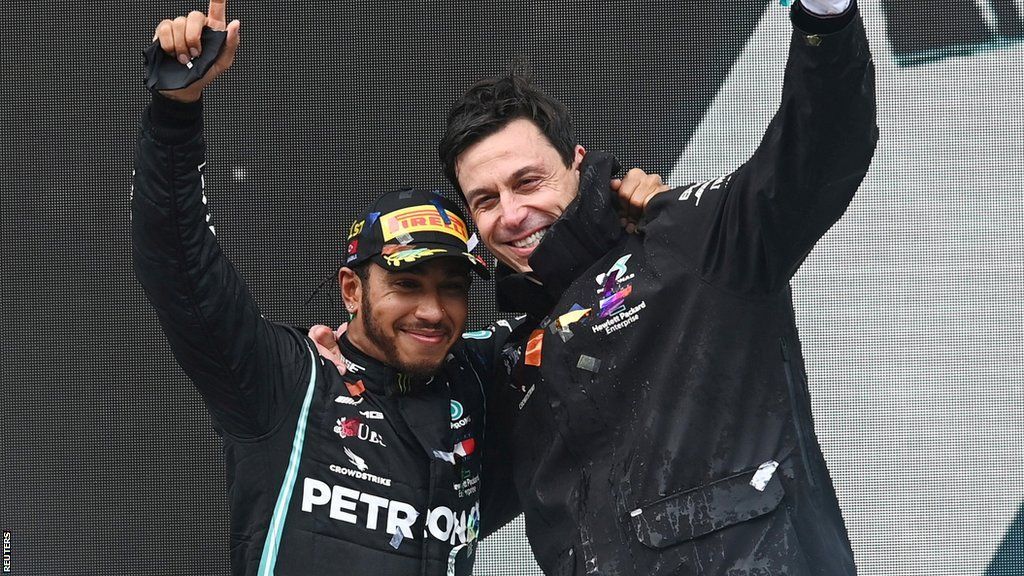 Lewis Hamilton and Toto Wolff celebrate on the podium at the Turkish Grand Prix in 2020