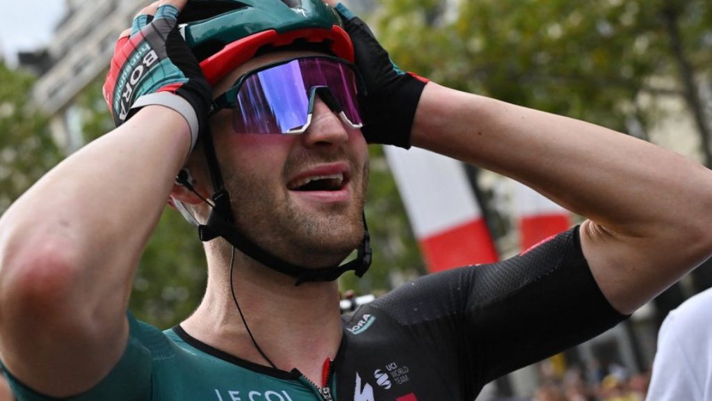Bora–Hansgrohe rider Jordi Meeus celebrates after winning stage 21 of the 2023 Tour de France