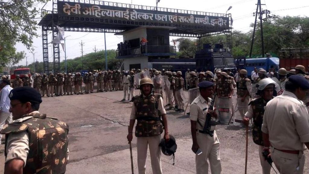 Curfew in central India after farmers die in clashes with ...