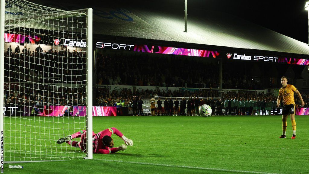 Brentford goalkeeper Ellery Balcombe starred in the penalty shoot out win over Newport