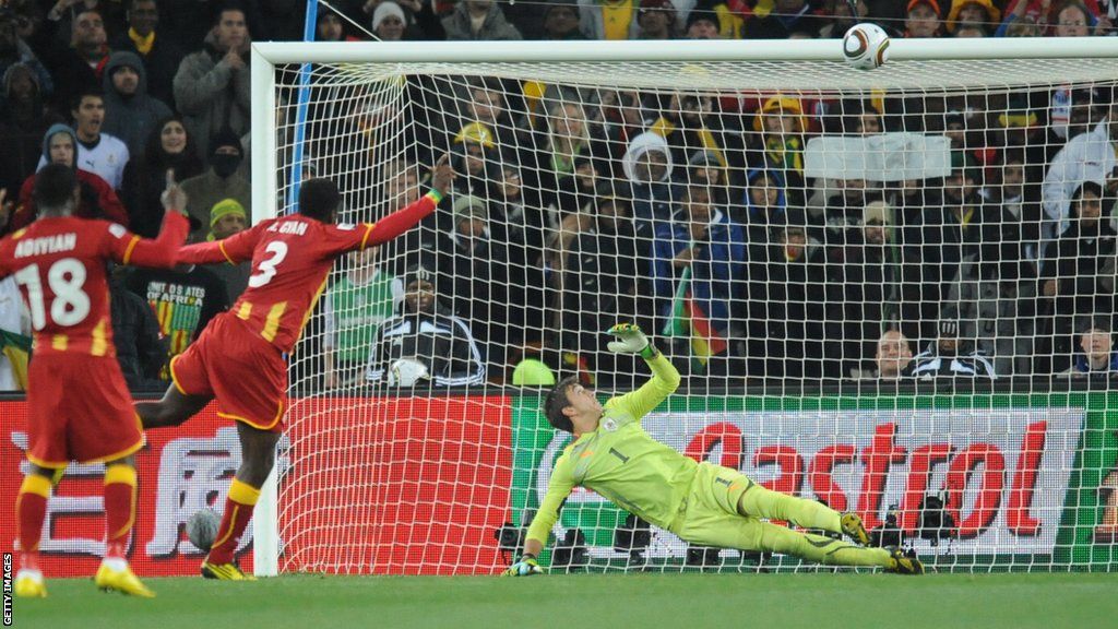 Asamoah Gyan sees his extra-time penalty clip the crossbar during Ghana's World Cup quarter-final against Uruguay