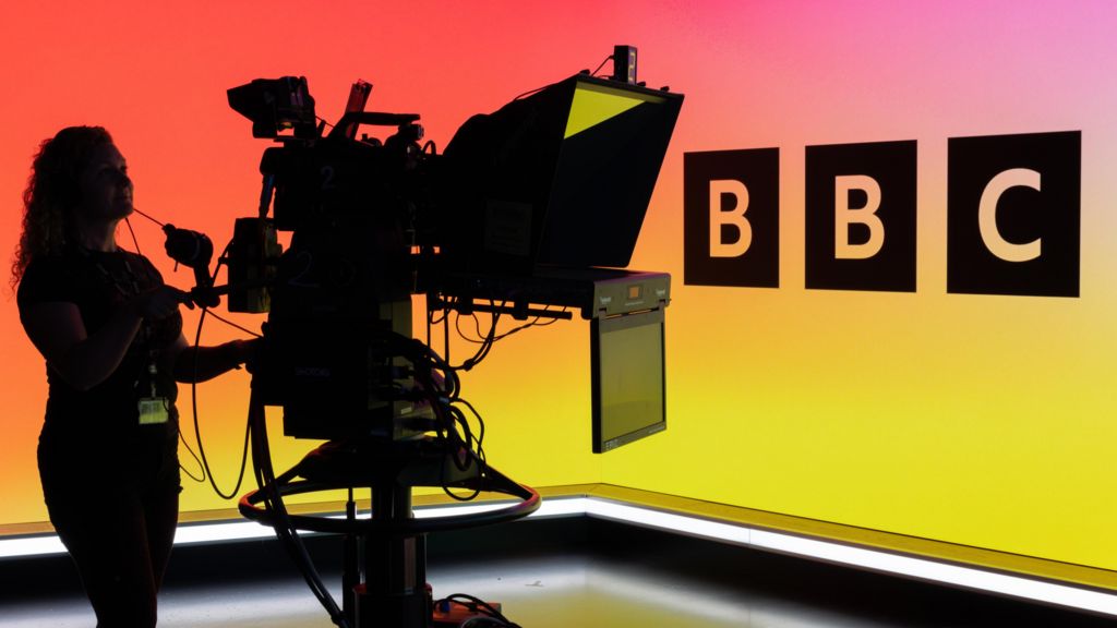 A camera operator in a BBC studio