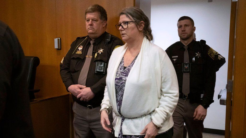 Jennifer Crumbley, the mother of Oxford, Michigan high school shooter Ethan Crumbley, enters the court to hear the verdict