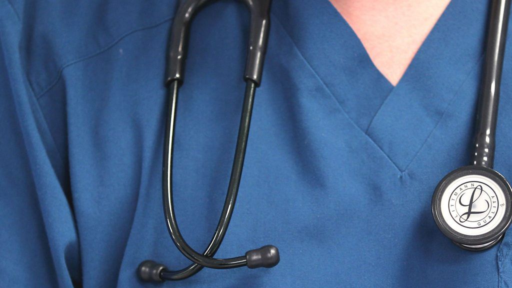 Person wearing a stethoscope