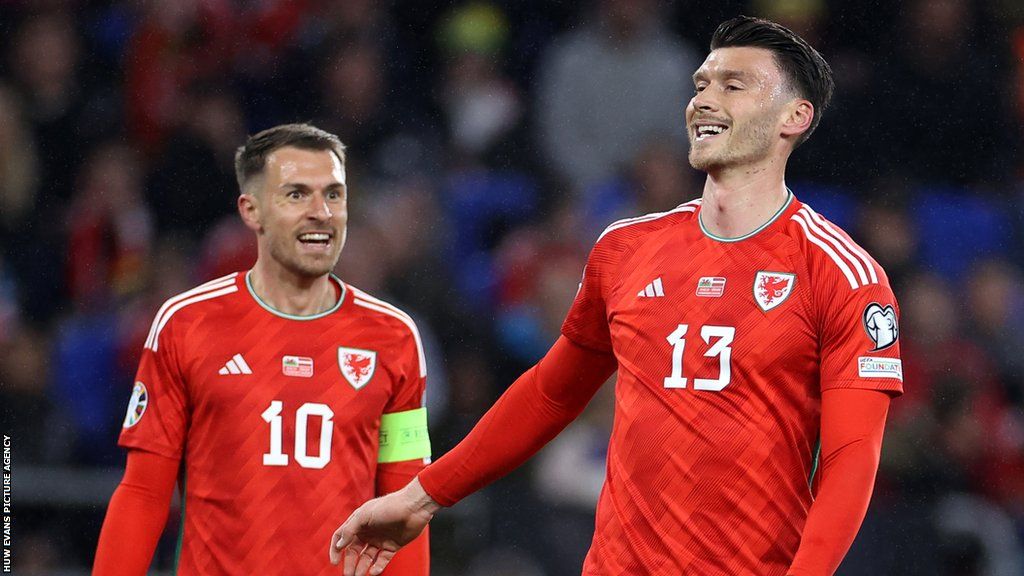A return to Cardiff would see Kieffer Moore (R) unite with Wales team-mate Aaron Ramsey