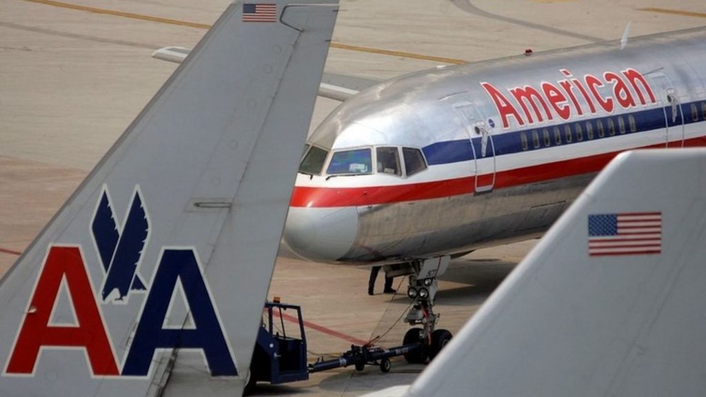 American Airlines suspends employee after clash over pram - BBC News