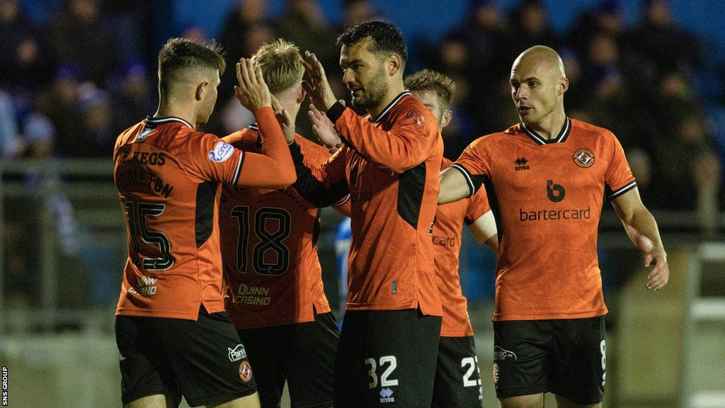 Dundee United's Tony Watt celebrates making it 2-0 with his teammates during a SPFL Trust Trophy match between Peterhead and Dundee United at Balmoor Stadium