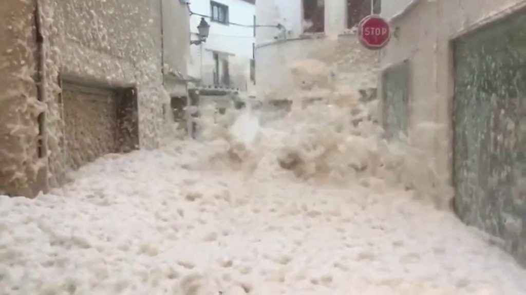 Marine foam brought ashore my Storm Gloria floods streets in Tossa De Mar in Spain.