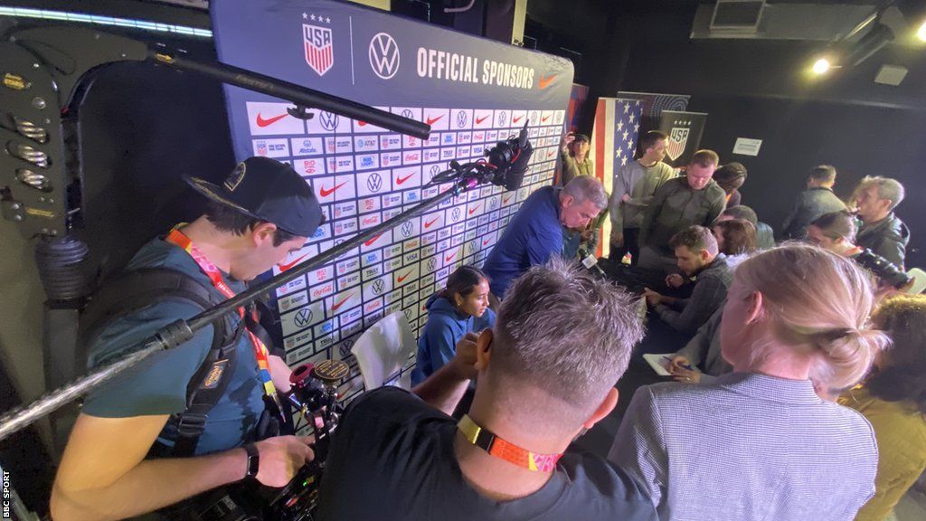 United States 18-year-old forward Alyssa Thompson (seated) surrounded by the world's media at a news conference in Auckland at the Fifa Women's World Cup