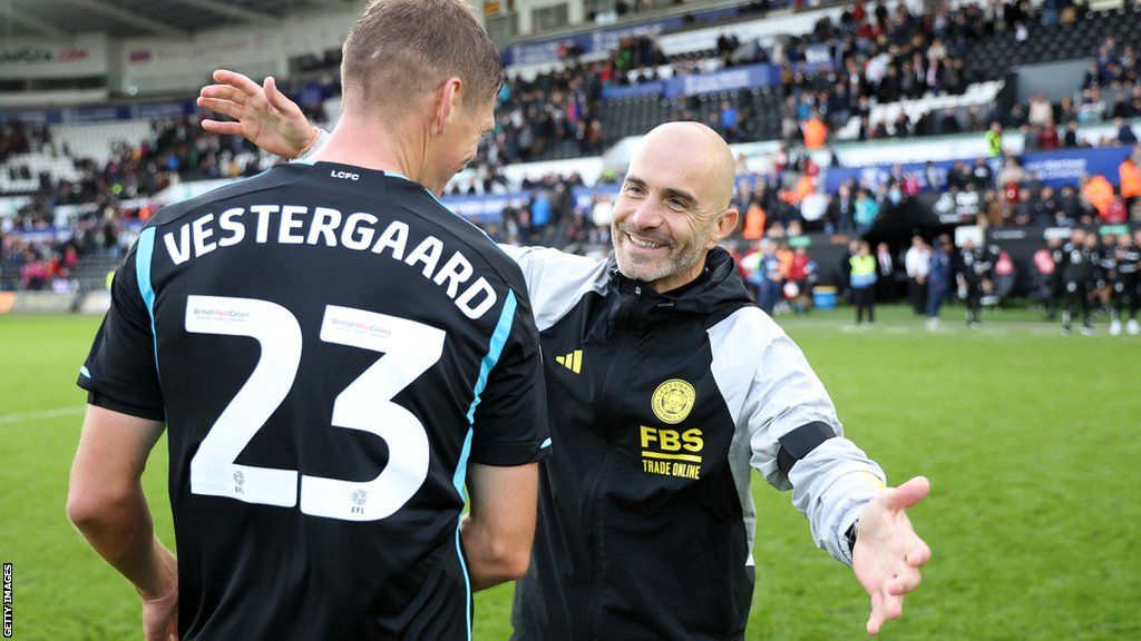 Leicester boss Enzo Maresca goes in to hug Jannik Vestergaard after a win