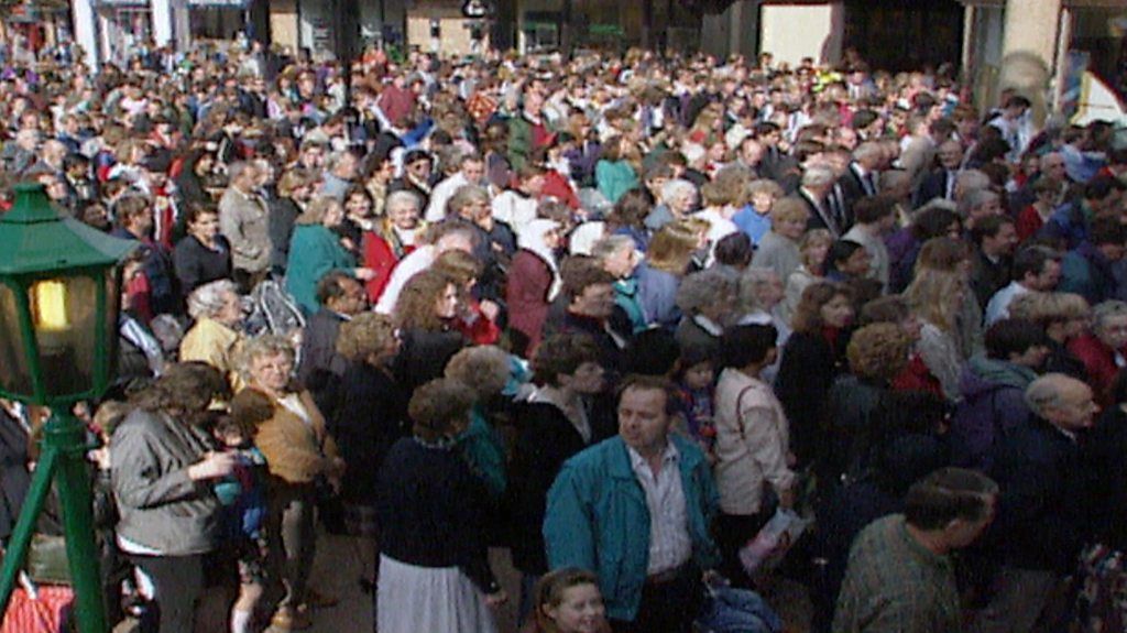 People queuing to get inside the Grafton Centre in Cambridge after it was reopened following expansion in 1995.
