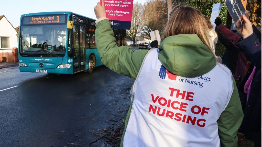A nurse at a picket line in Cardiff
