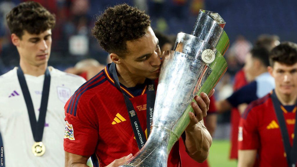 Rodrigo kisses the Nations League trophy in June