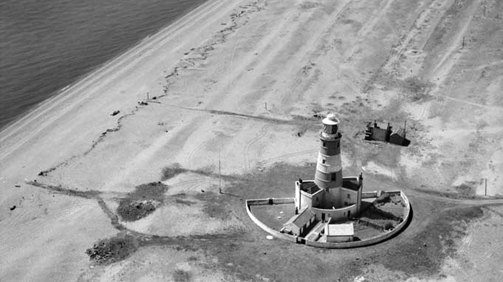 Aerial view of Orfordness Lighthouse taken in 1951 from Historic England Britain from Above archive