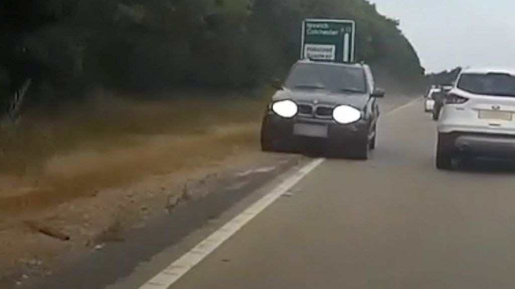 Footage shows the car being driven towards oncoming traffic as a man tried to evade arrest.