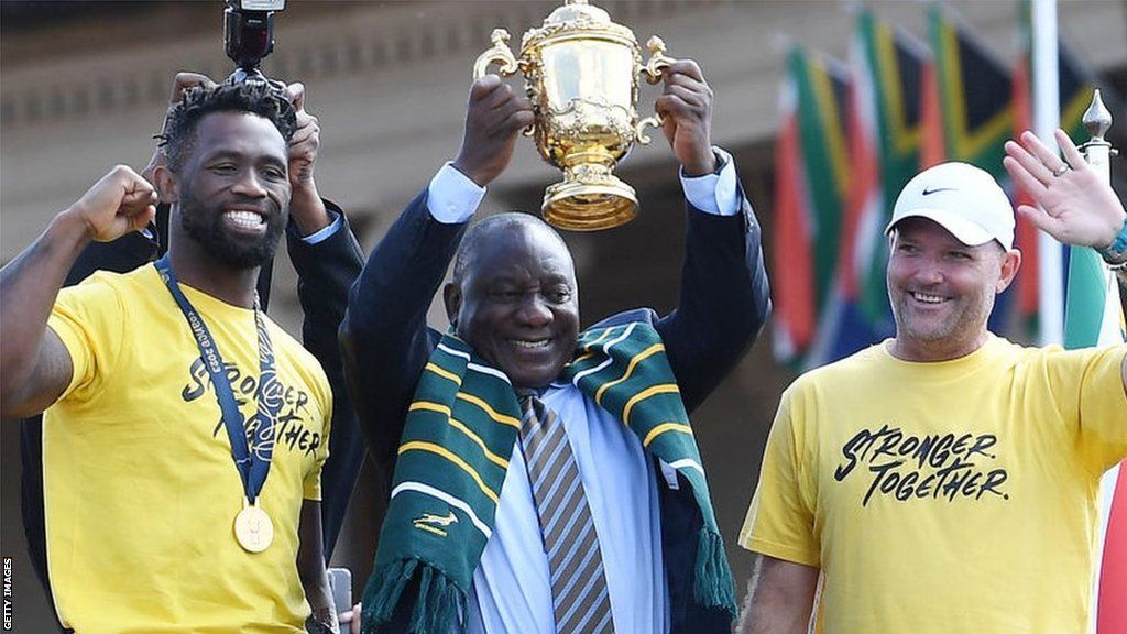 Captain Siya Kolisi, President Cyril Ramaphosa and head coach Jacques Nienaber lift the trophy during the Rugby World Cup 2023 Springbok Trophy Tour in Pretoria at Union Buildings on 2 November 2023