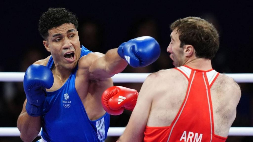 Great Britain's Delicious Orie (left) in action against Armenia's Davit Chaloyan during the Men's +92kg 